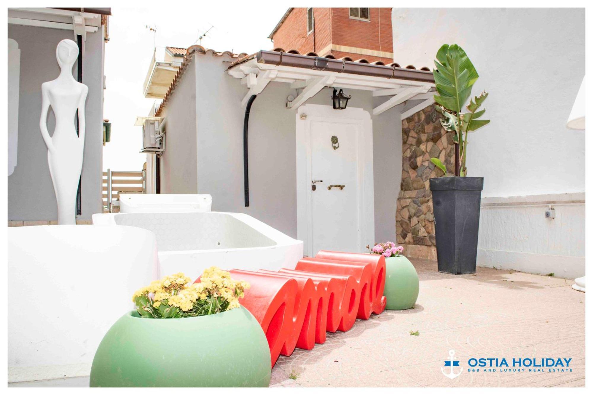 Ostia Holiday Greed Palace Bagian luar foto