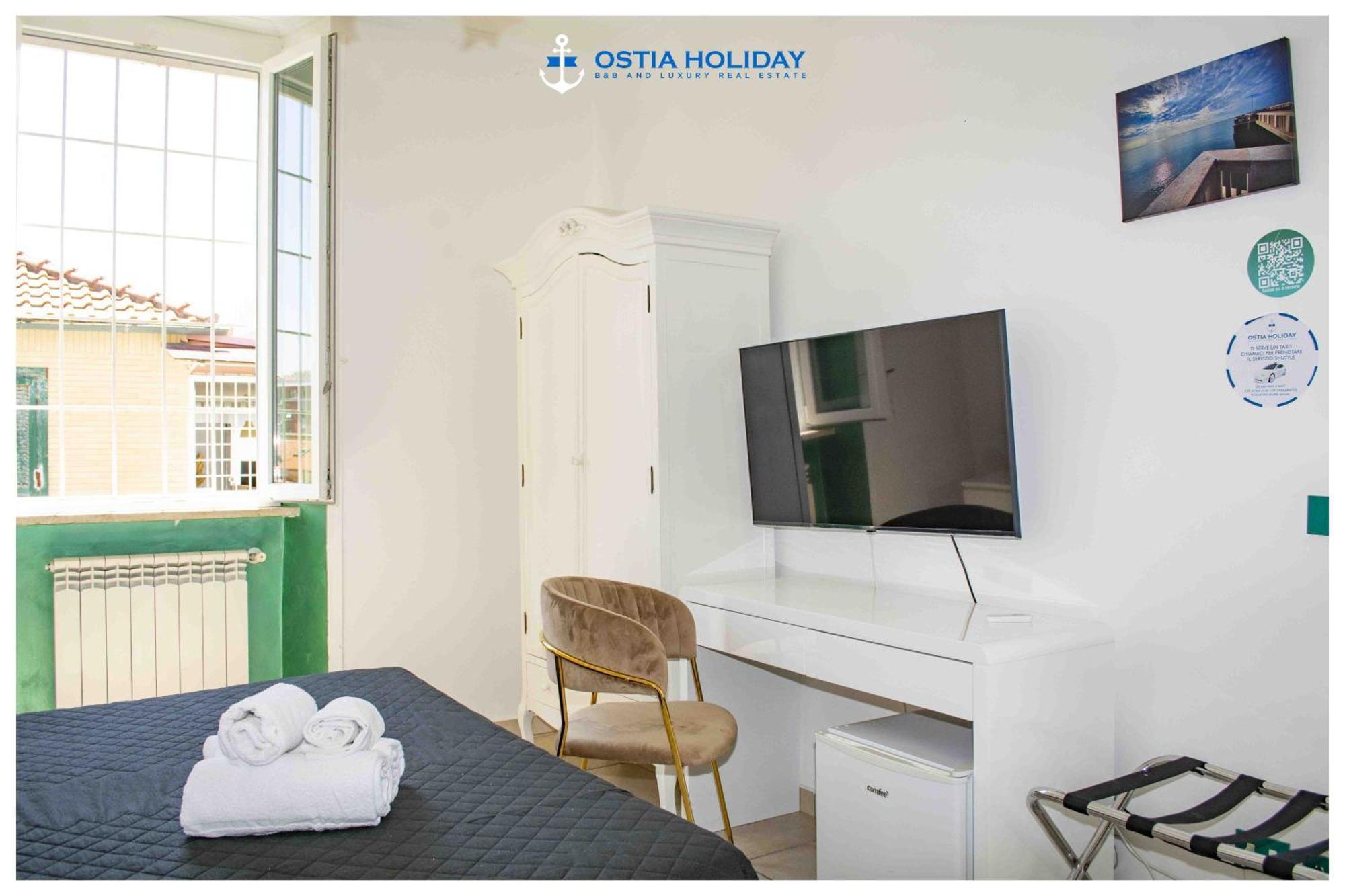 Ostia Holiday Greed Palace Bagian luar foto